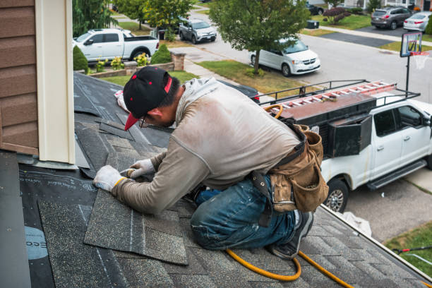 Professional Roofing technician working in Somersworth, NH